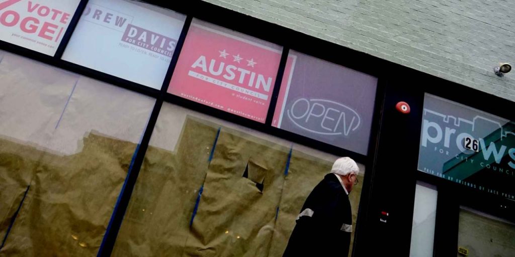 Uptown Oxford Business windows with political signs